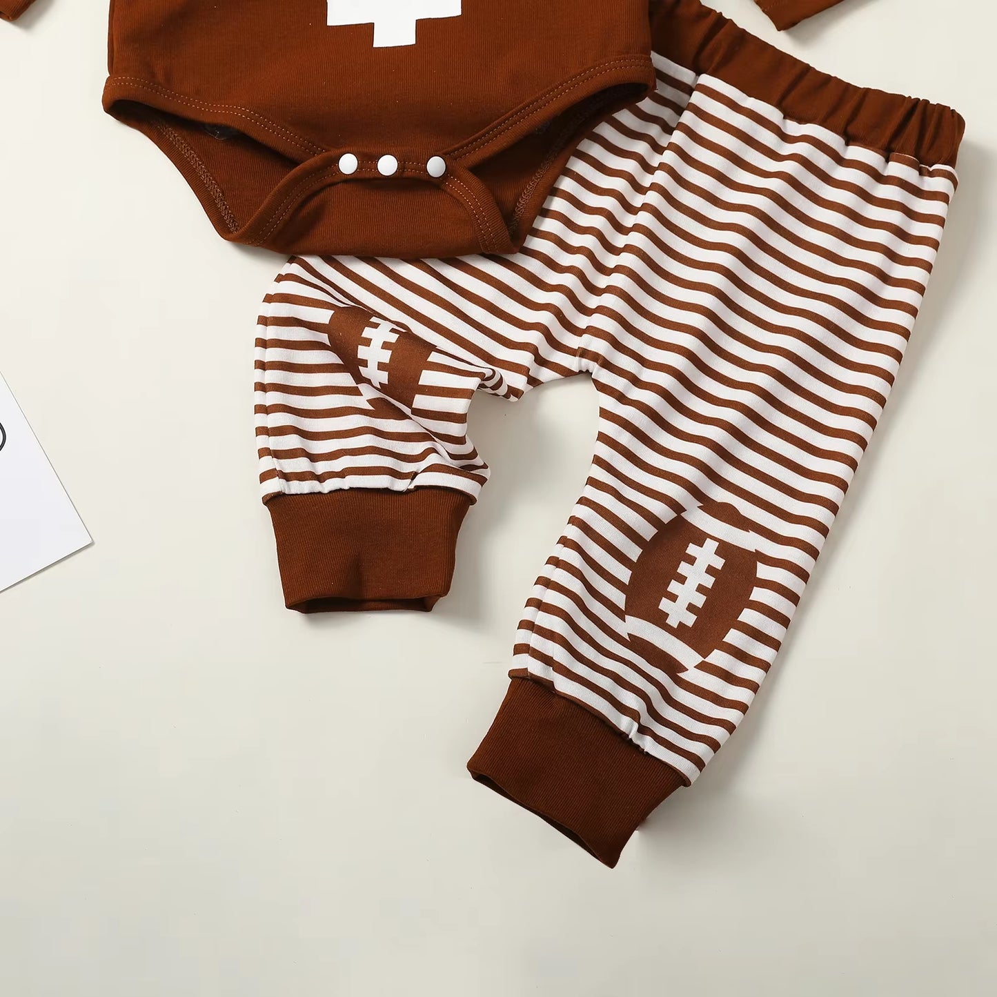 Adorable Baby Boy Football Print 3-Piece Outfit Set with Long Sleeve Romper, Striped Pants, and Beanie Hat for Fall & Spring